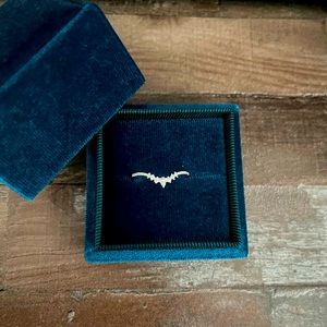 Pear shaped curved wedding band